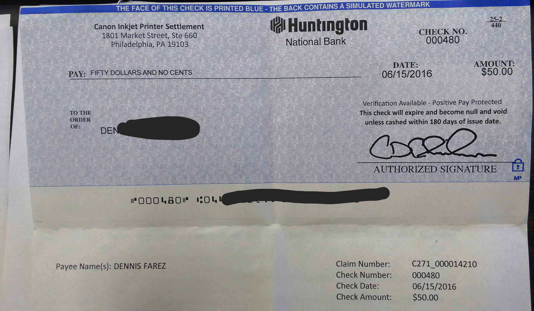 Canon settlement check.jpg