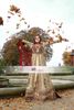 A British Muslim Bride throwing leaves in air.jpg
