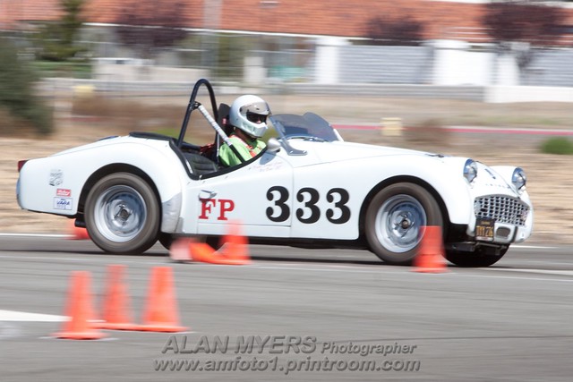 Panned with EF 70--200mm f_2.8 IS USM, 1_80 shutter speed