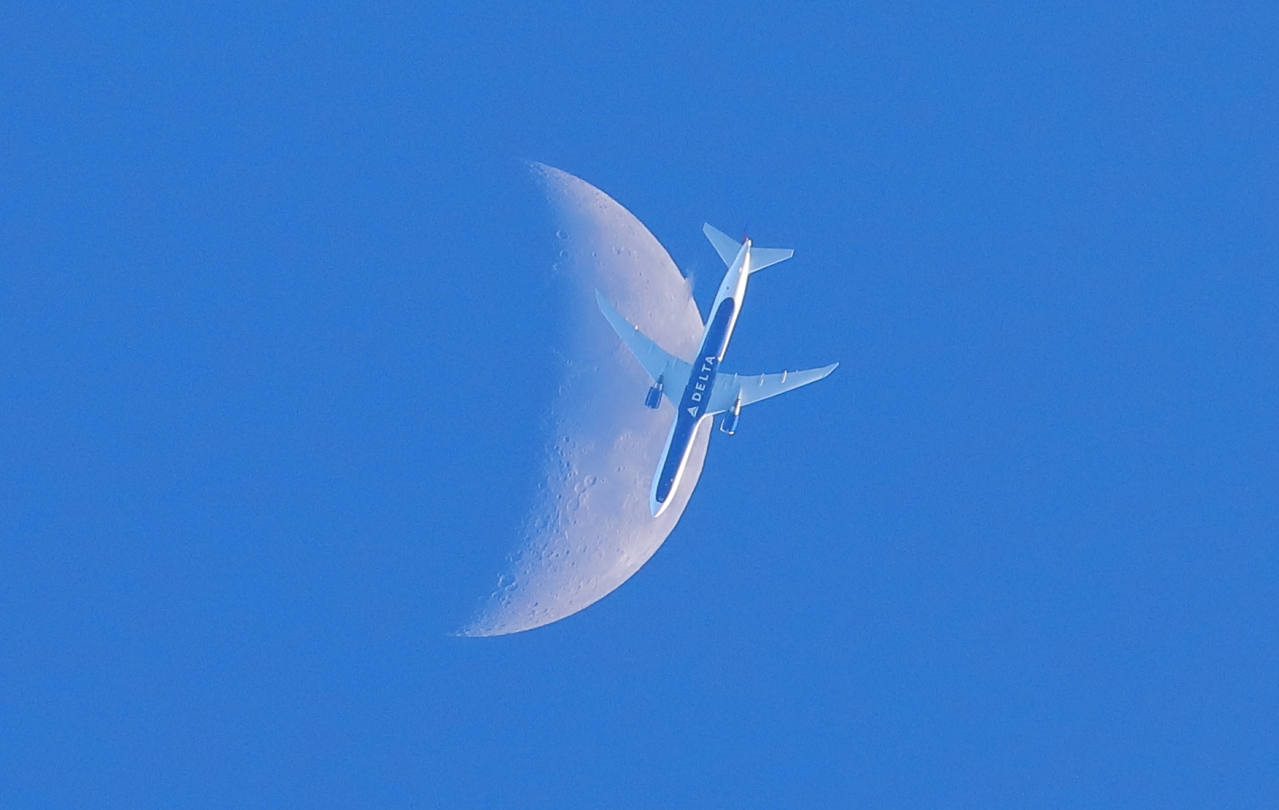 Moon and Airliner