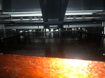 bottom of the printer on normal position (on flat surface)
