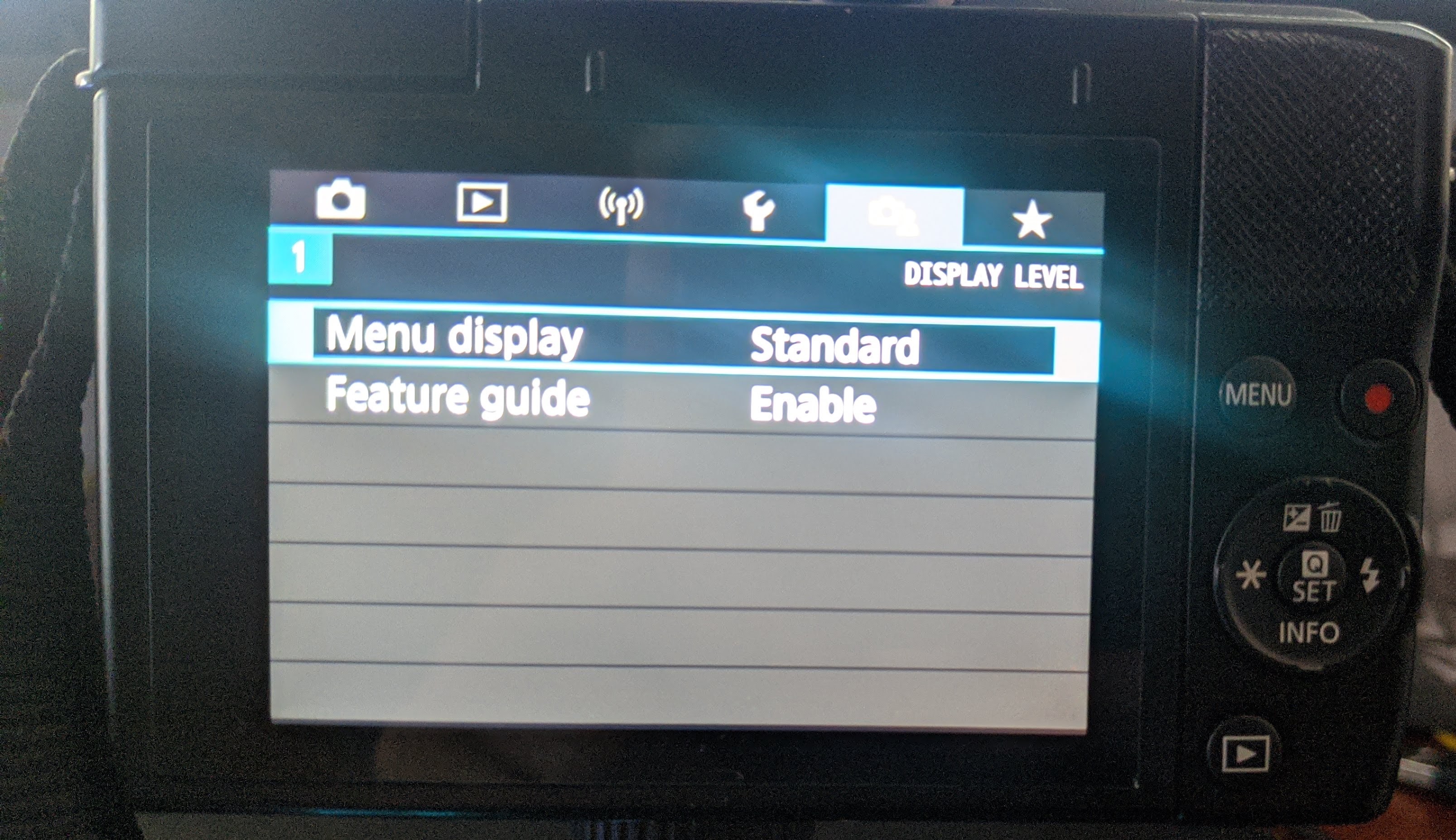 Solved White and colored spot on LCD screen EOS M200 Canon Community