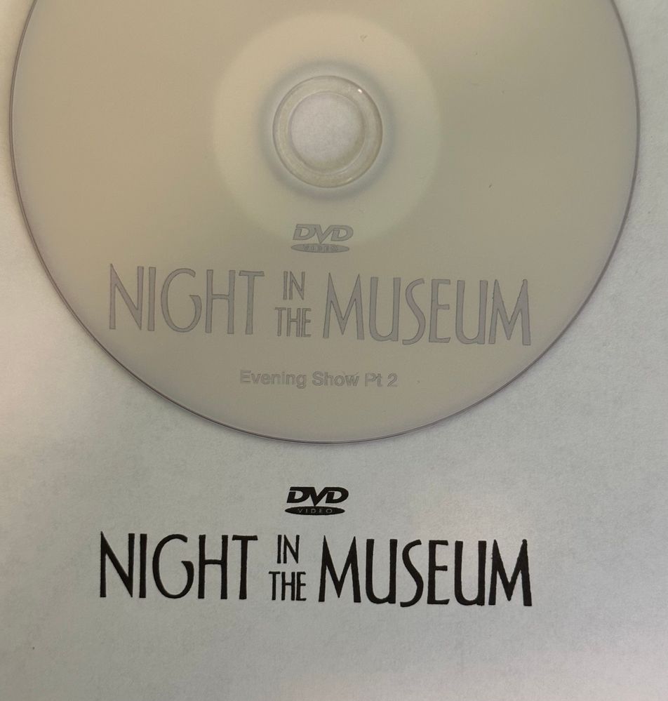 The black text prints correctly on plain white paper but is very faint on a printable DVD.