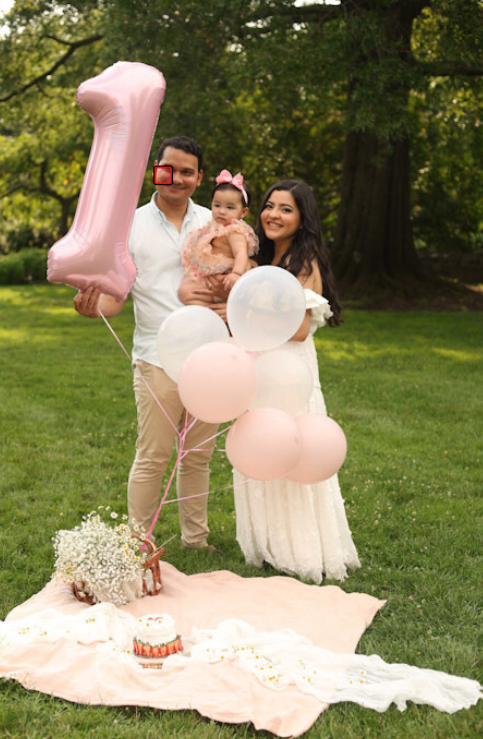 Even though AF point is near a dad's eye, his face is completely blurred and mom's face (more forward) is more in focus as well as the balloon