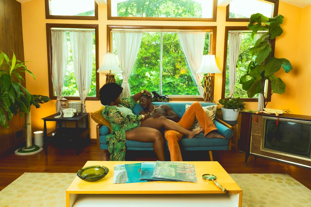 Both models relaxing in the living room