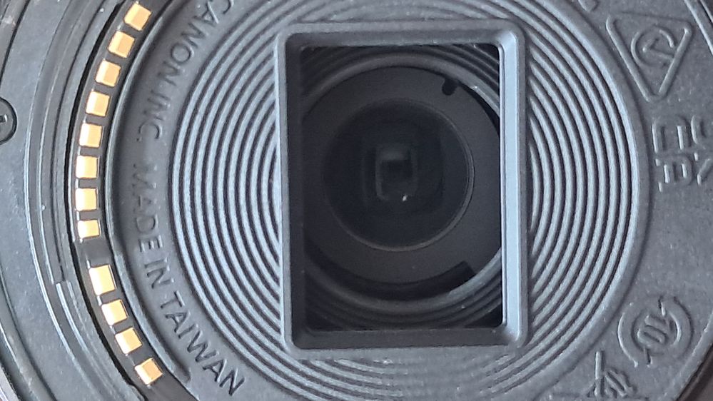 lst lens. The mark is almost centre on the rear element.