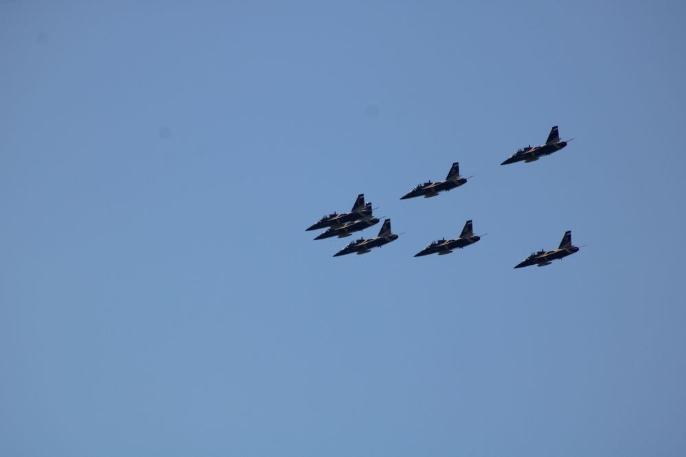 Upper left then above 1st left plane then above 1st right plane